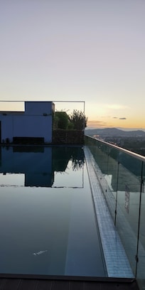 Pool and rooftop view