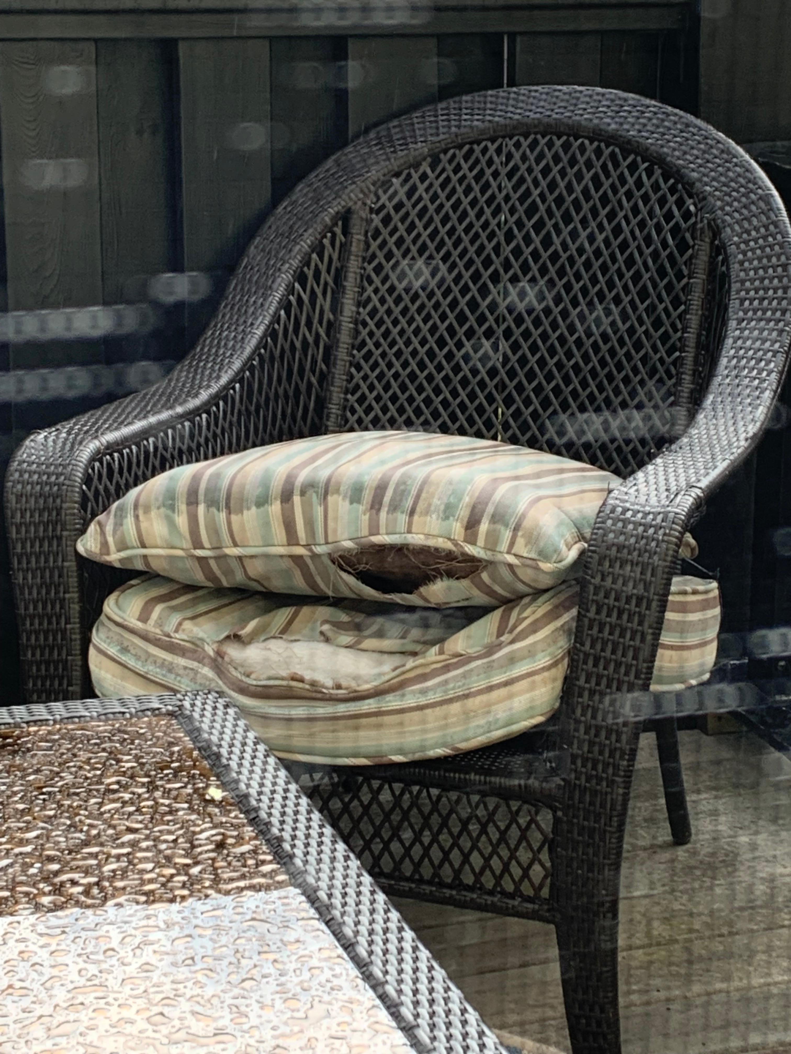 Ripped cushions on balcony. Balcony not attractive. 