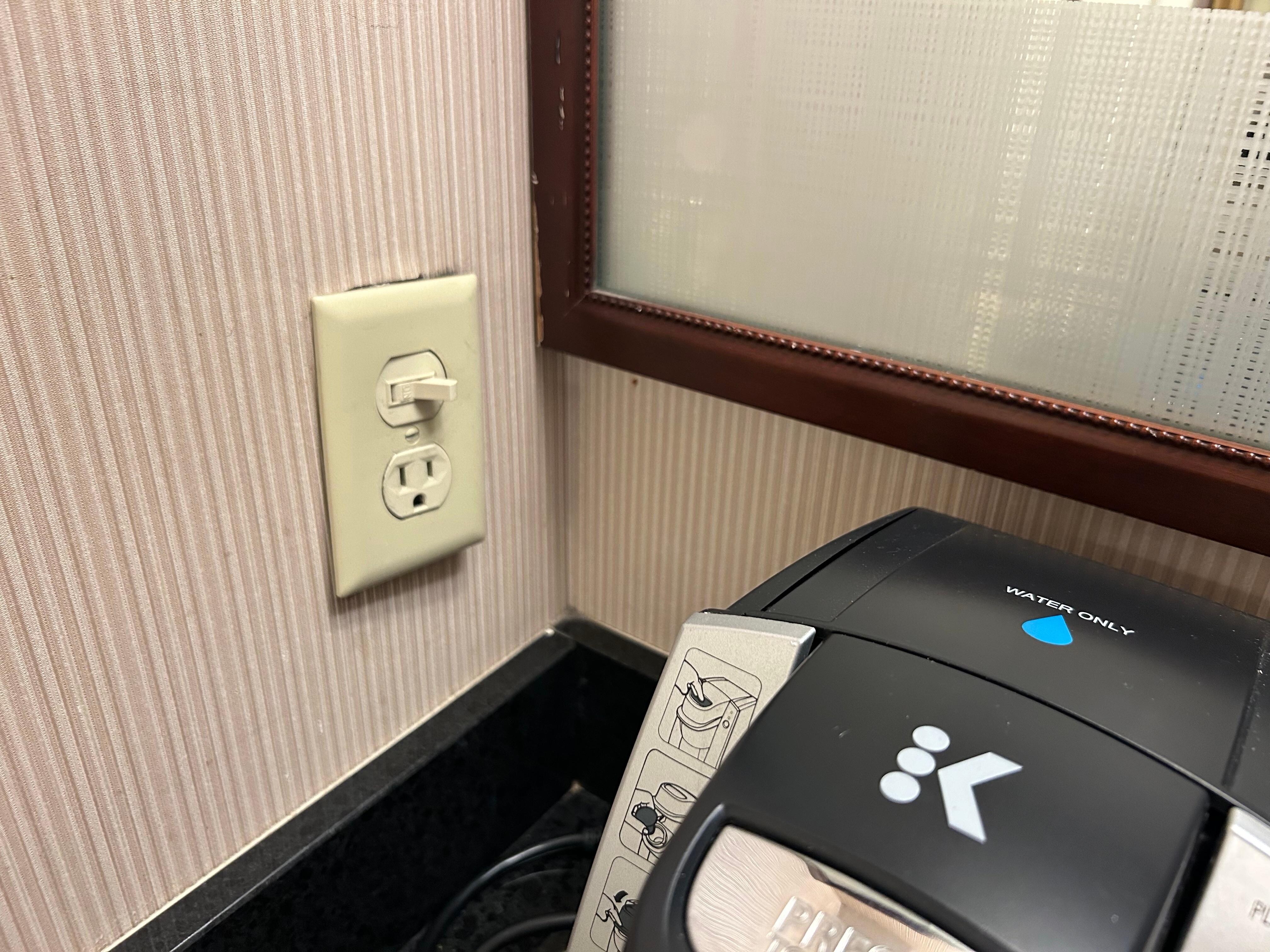 Outlet hanging out of wall