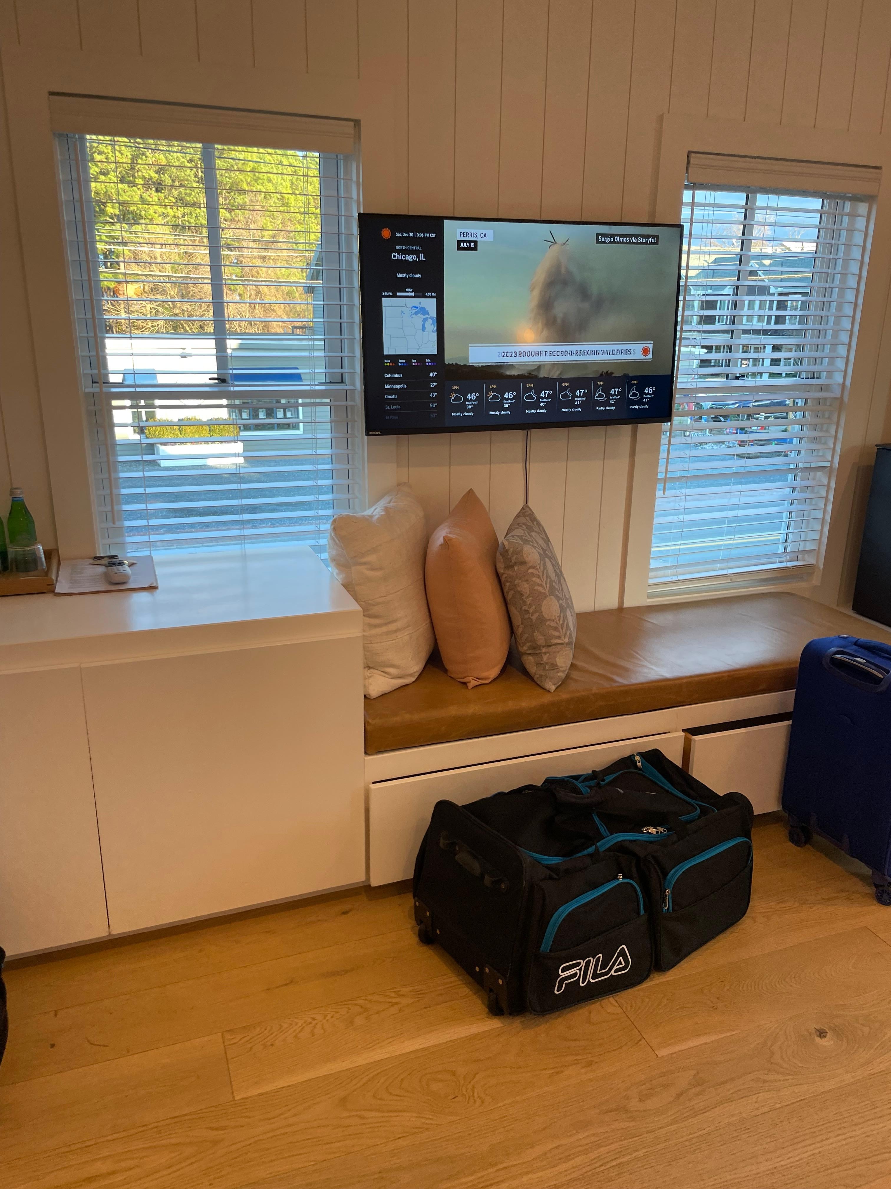 Room could use a chair bc banquette is under the TV