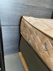 Bed two - second stained and torn mattress