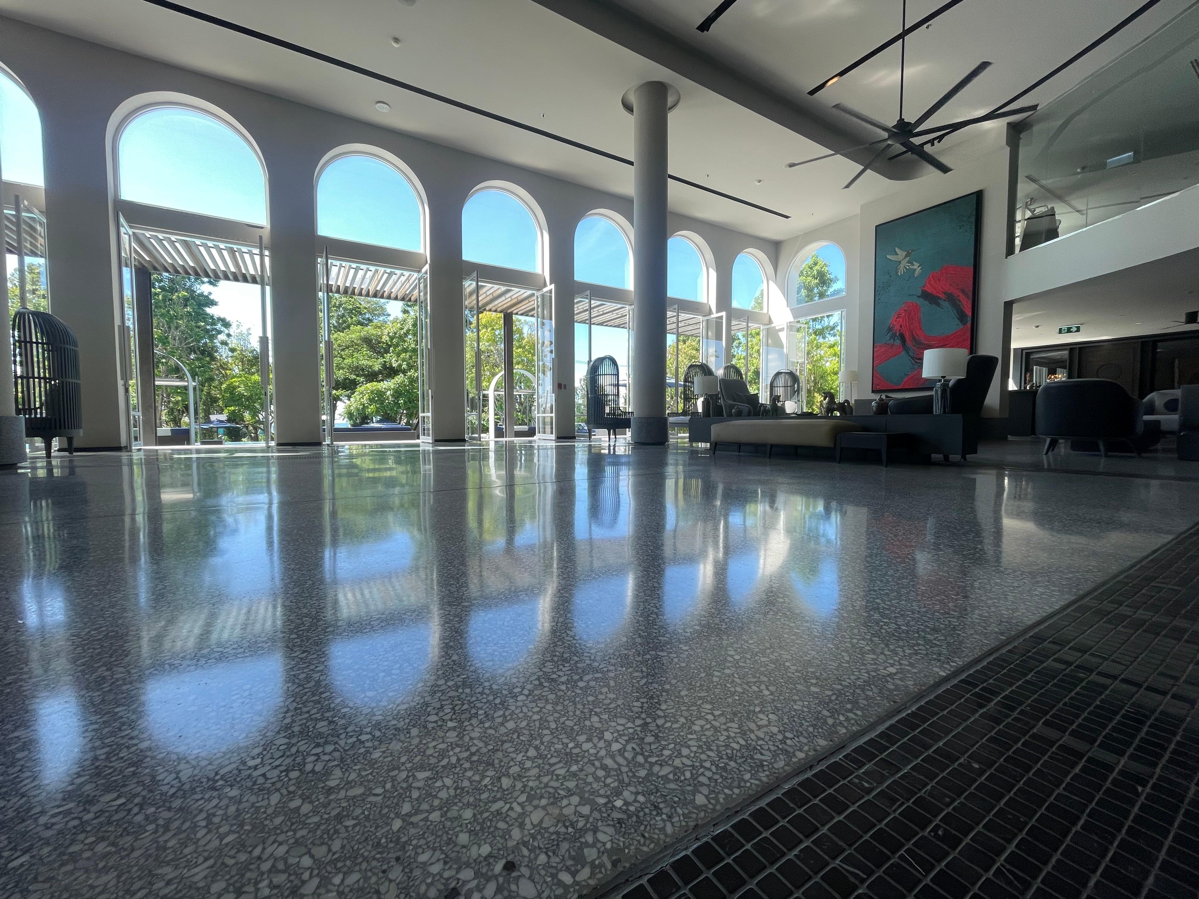 Beautiful, dramatic entrance and main lobby with views of the pool