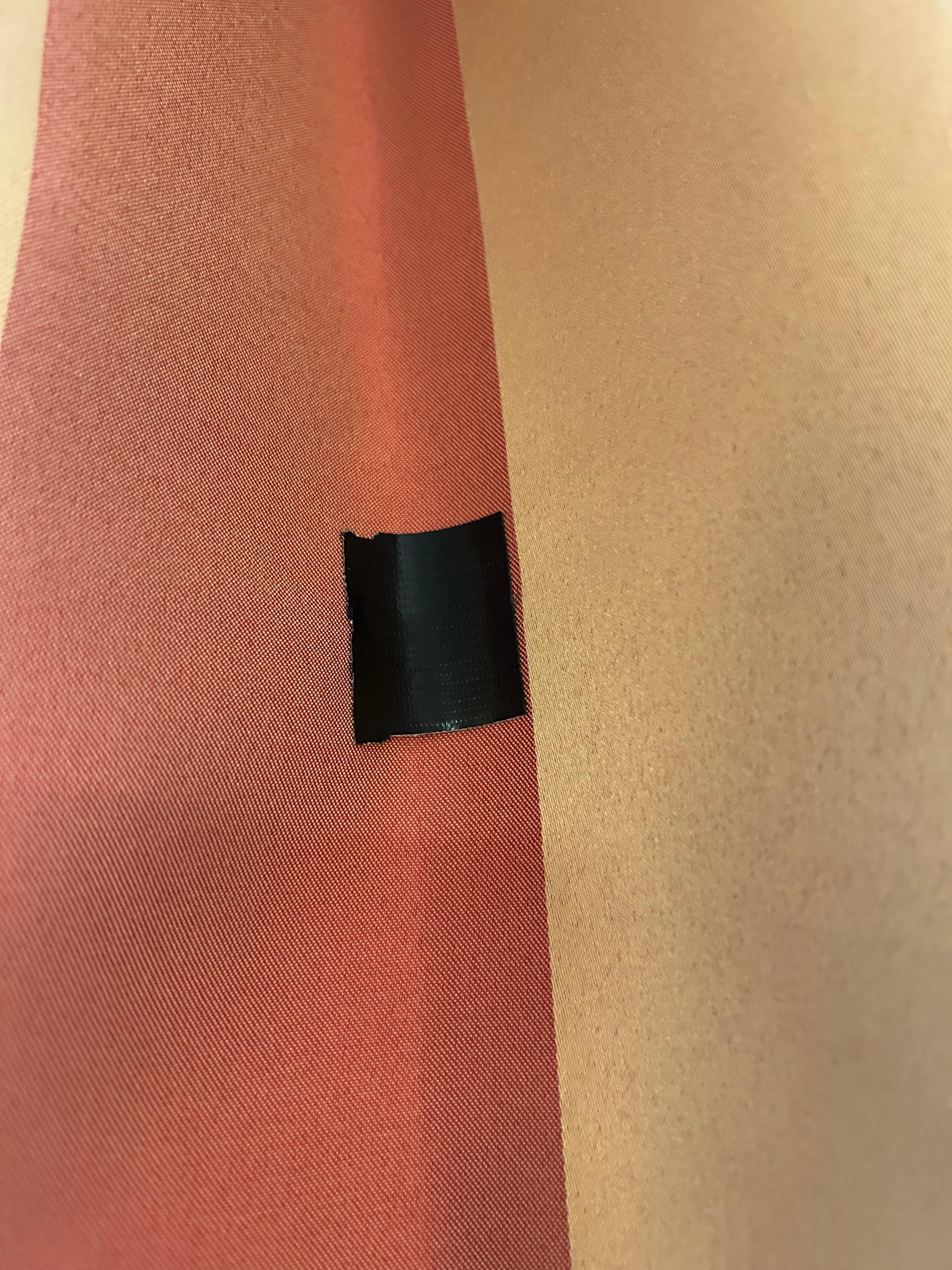 They tried to cover the holes up with tape. 