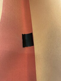 They tried to cover the holes up with tape.