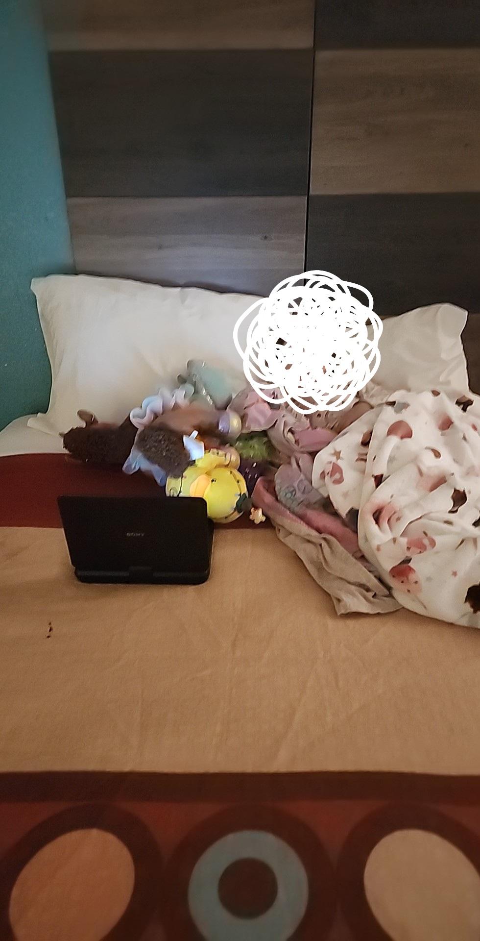 Took a picture of my daughter for memories and ypu can see the dirty spot on the bed.