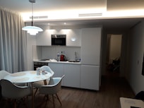 View from lounge kitchen towards bedroom