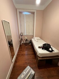 single room with shared bathroom