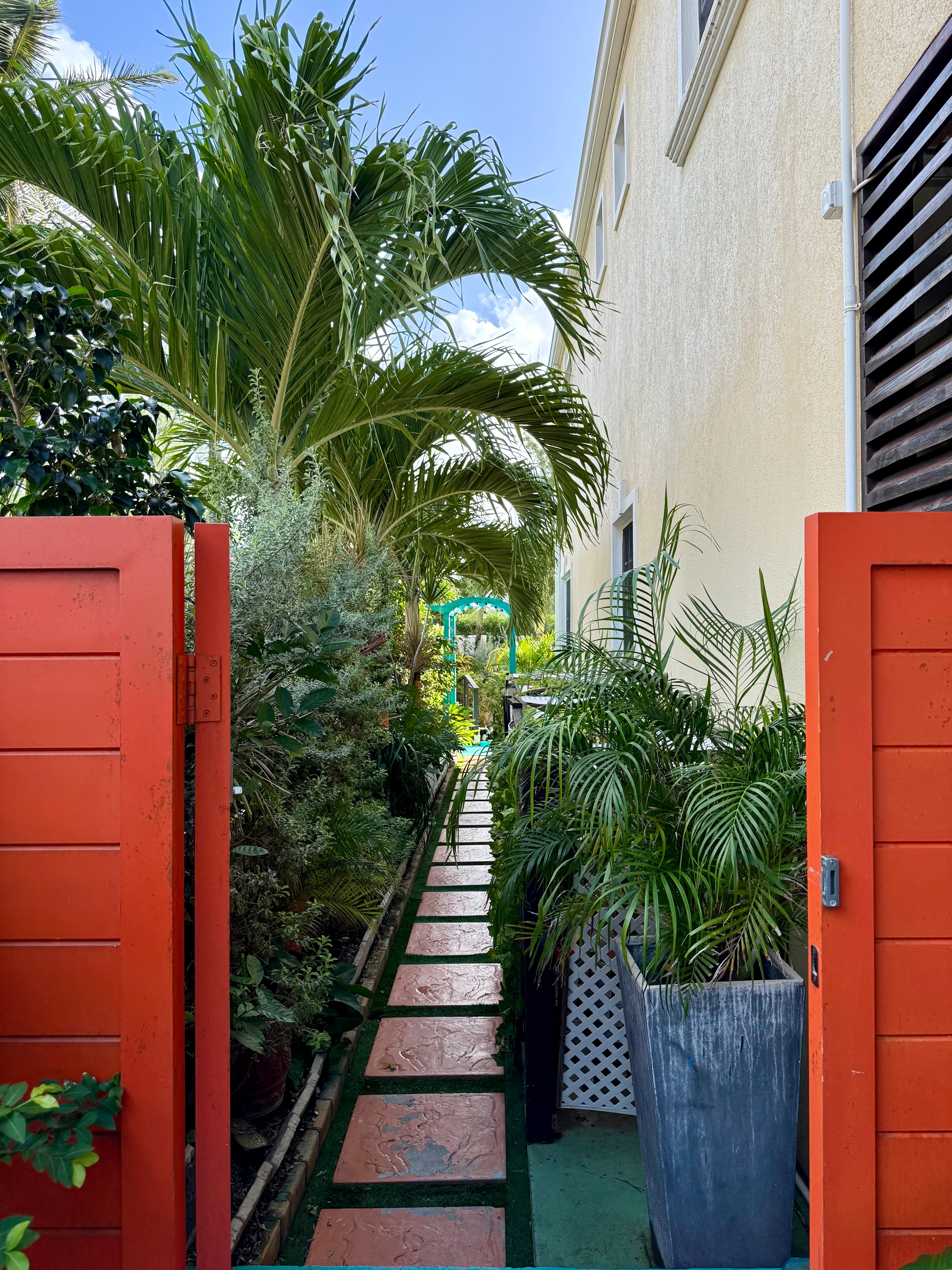 Walkway to the pool from the garden and Koy pond. 