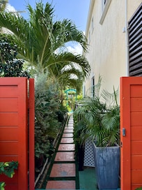 Walkway to the pool from the garden and Koy pond.