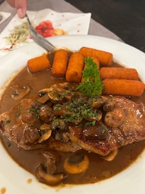 Jäger Schnitzel at the on site restaurant. The croquettes were delicious!