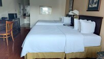 Chambre avec 2 grands lits