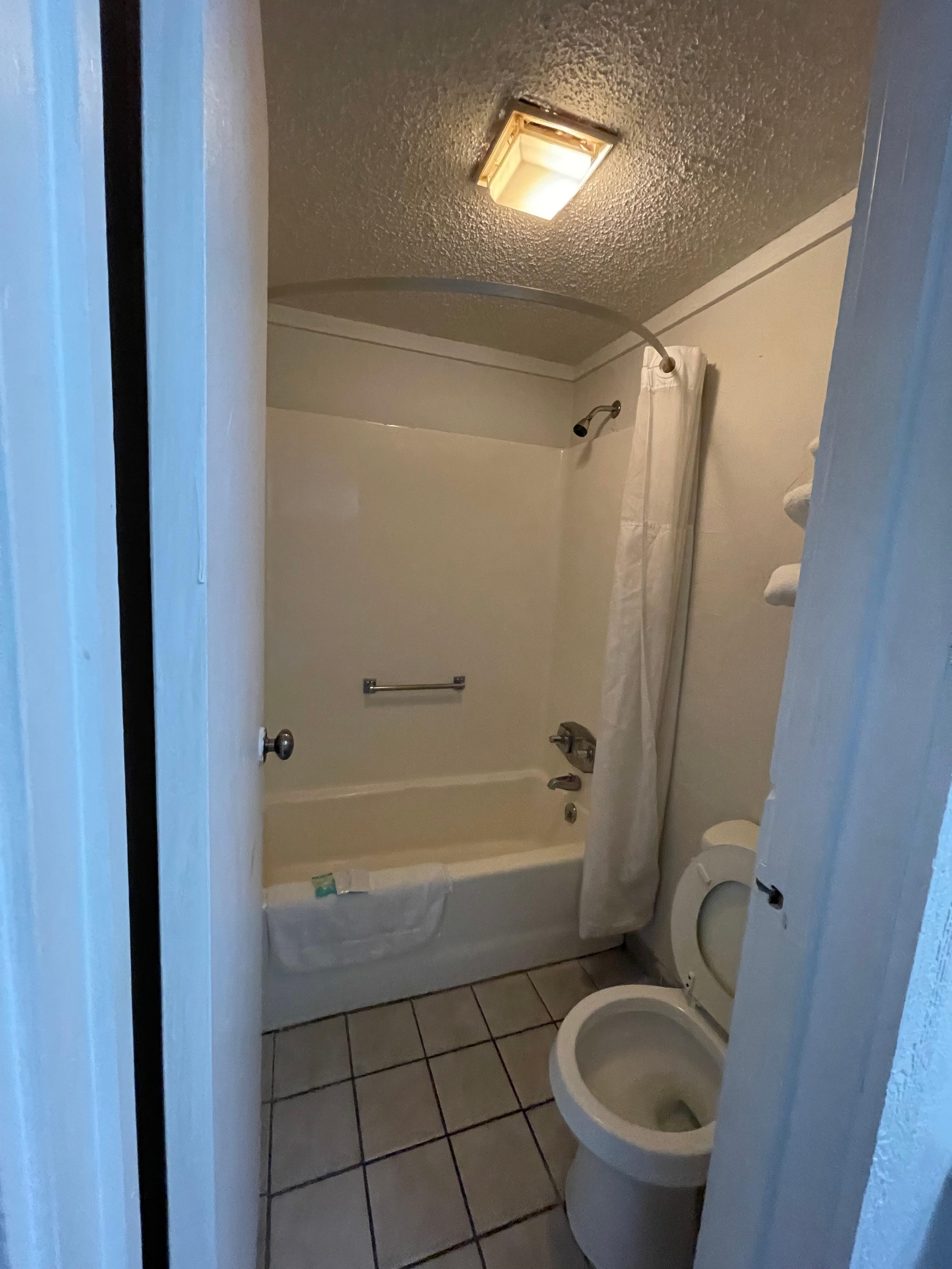 Only one burn visible until I moved bathmat, when I sat the toilet seat down paint was worn off from years of scrubbing.  