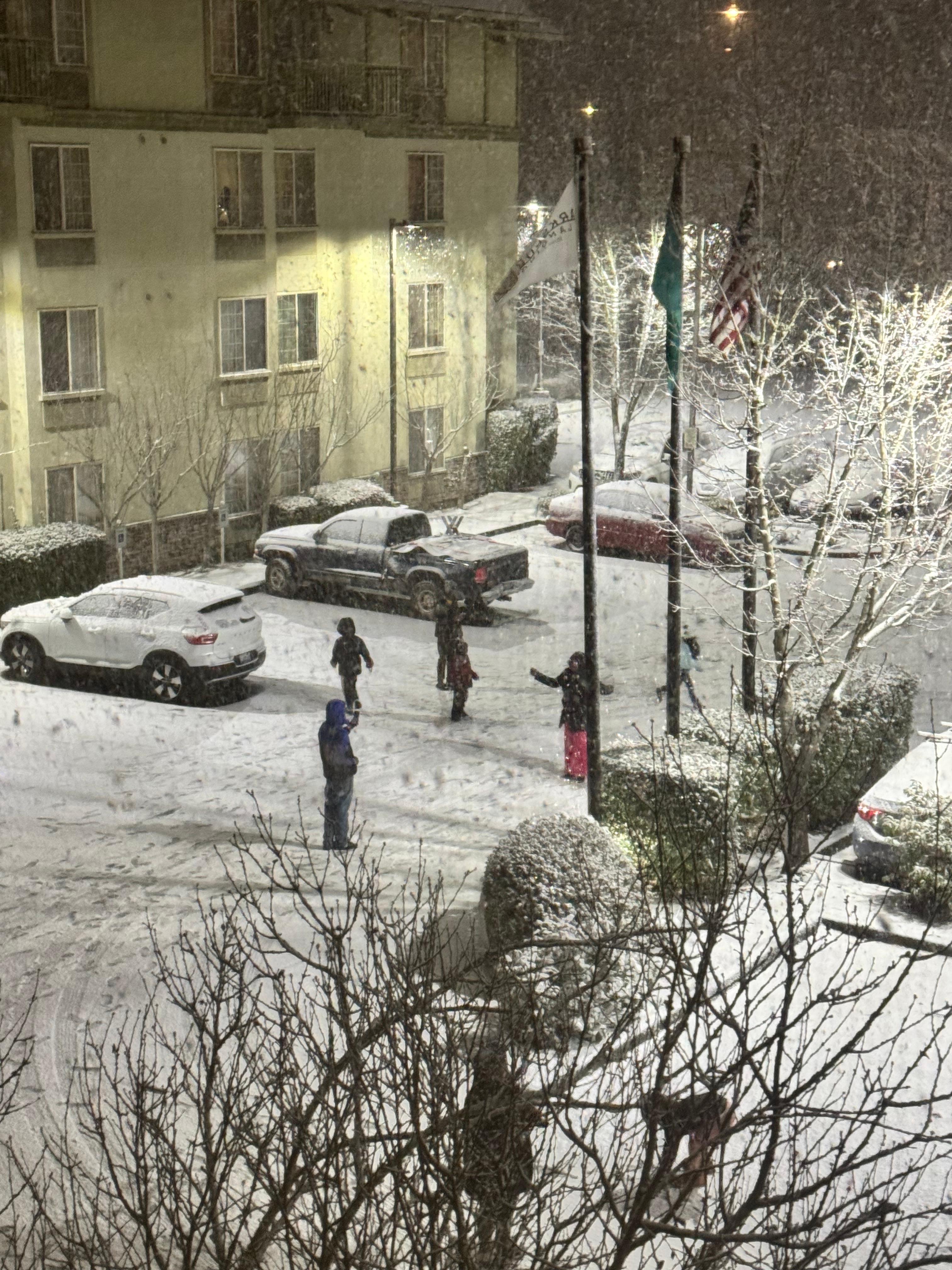 Snowball fight in the parking lot!