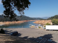 Boat-launch and marina dock is presently 40 ft below usual level.