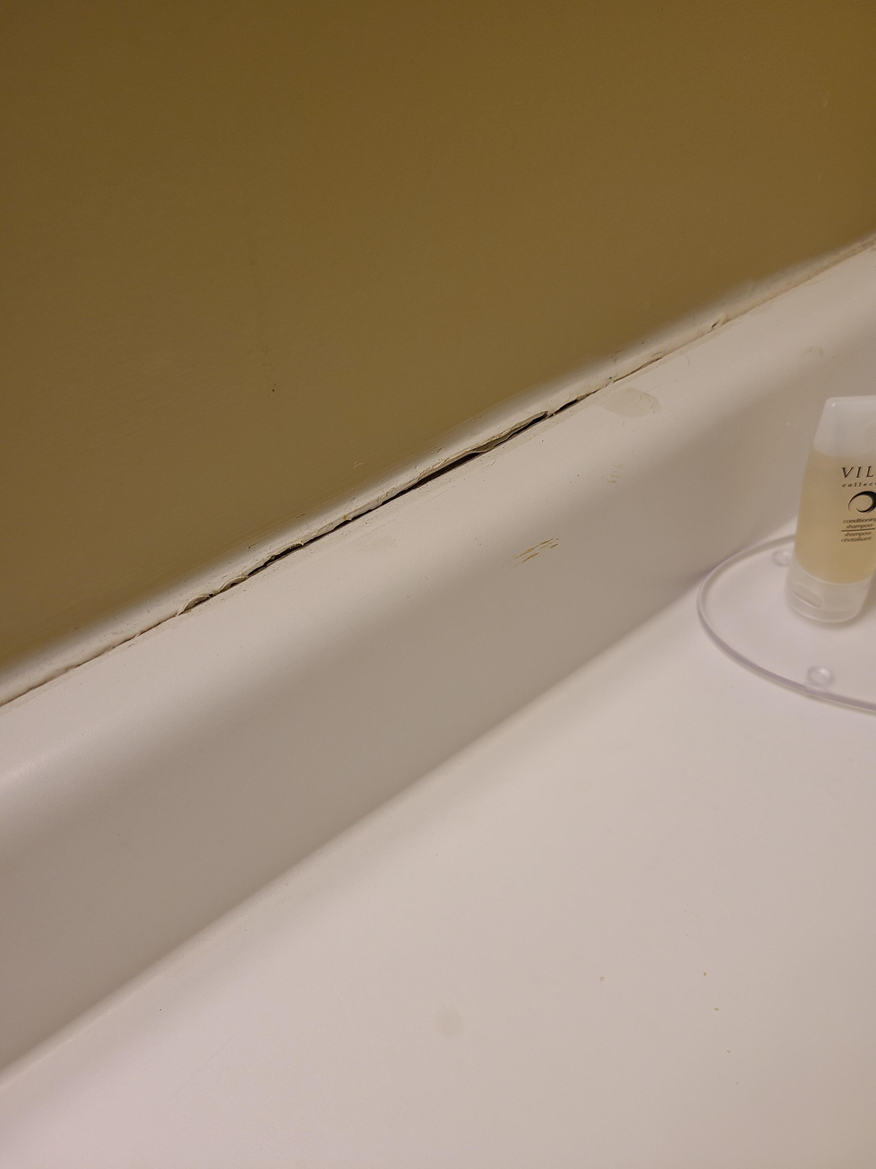 Peeling grout and silicone 