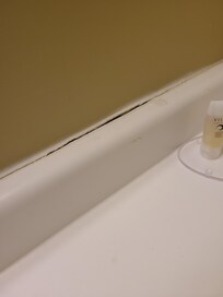 Peeling grout and silicone