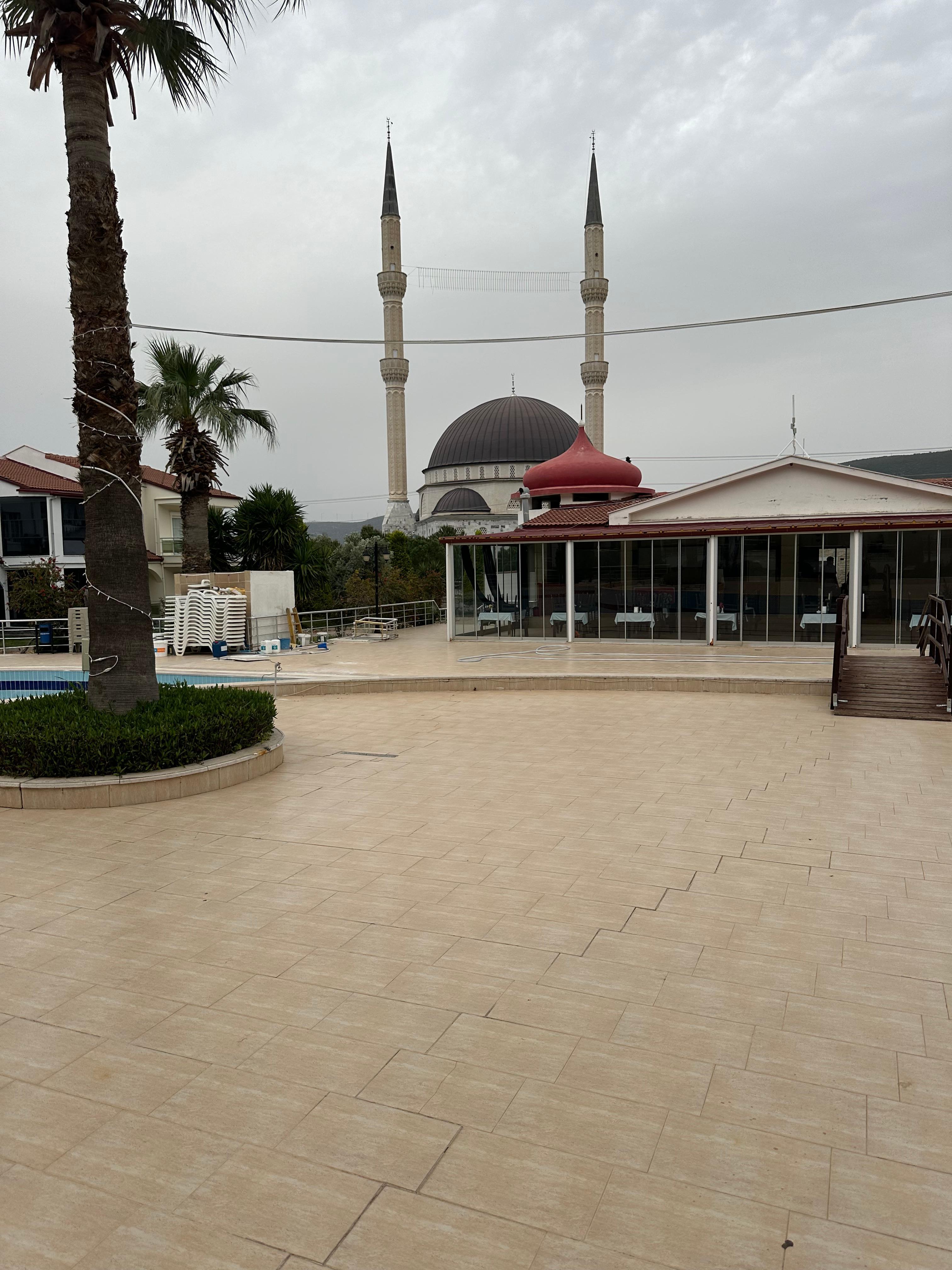 Large and noisy mosque directly access the road. 