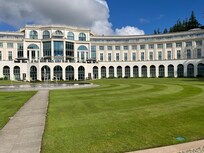 Back with balcony rooms looking toward mountains