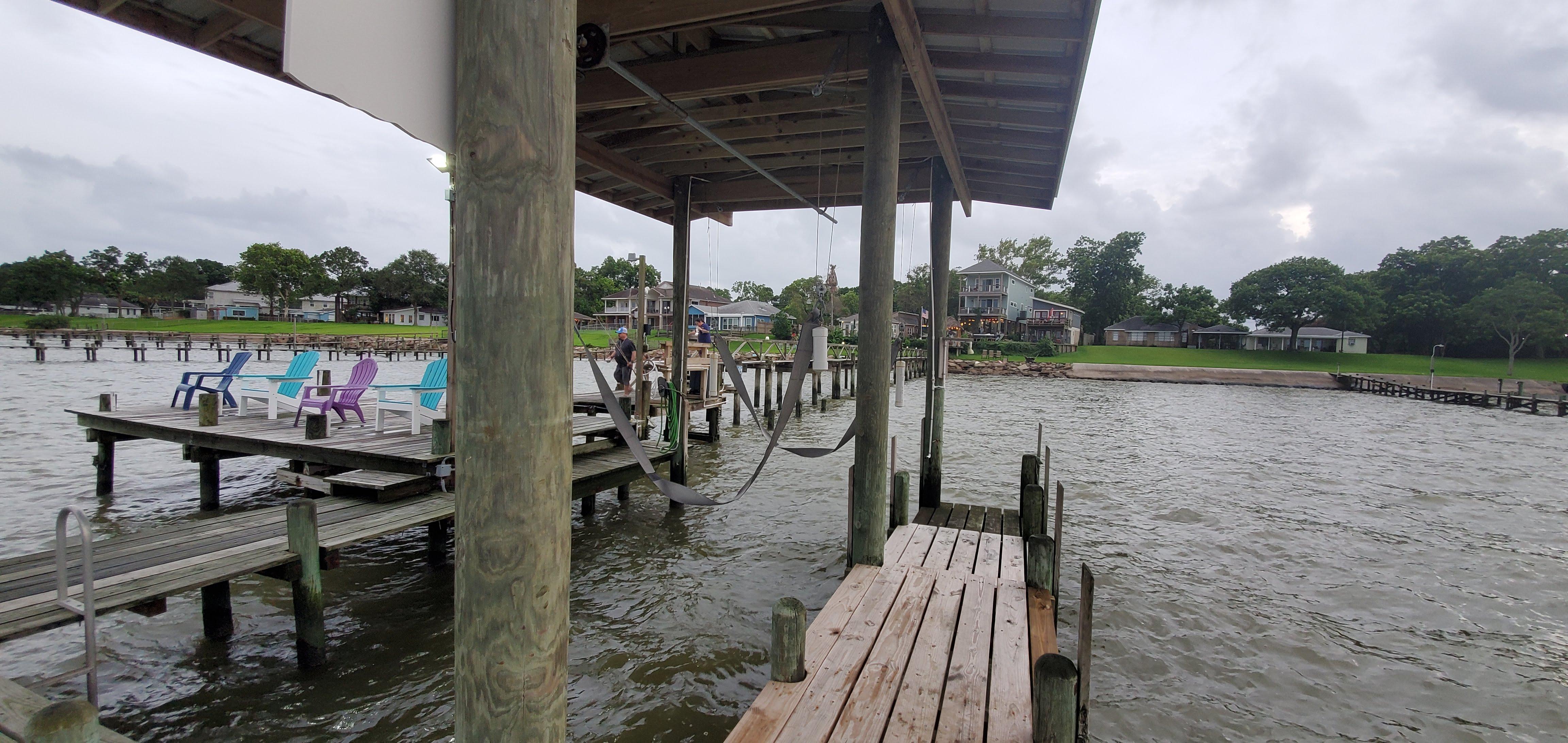 View looking back at house from pier