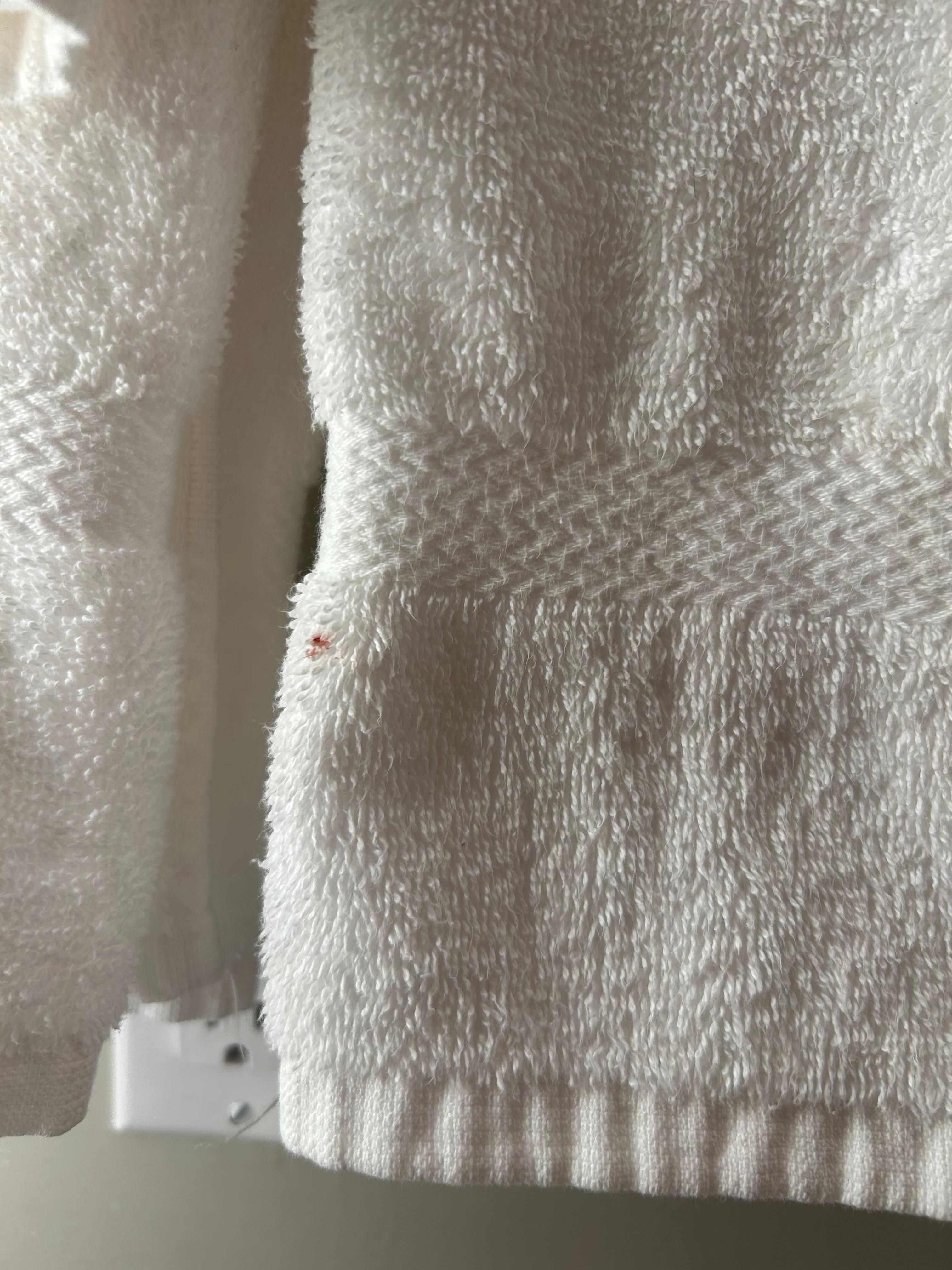 “Red” stain on multiple towels