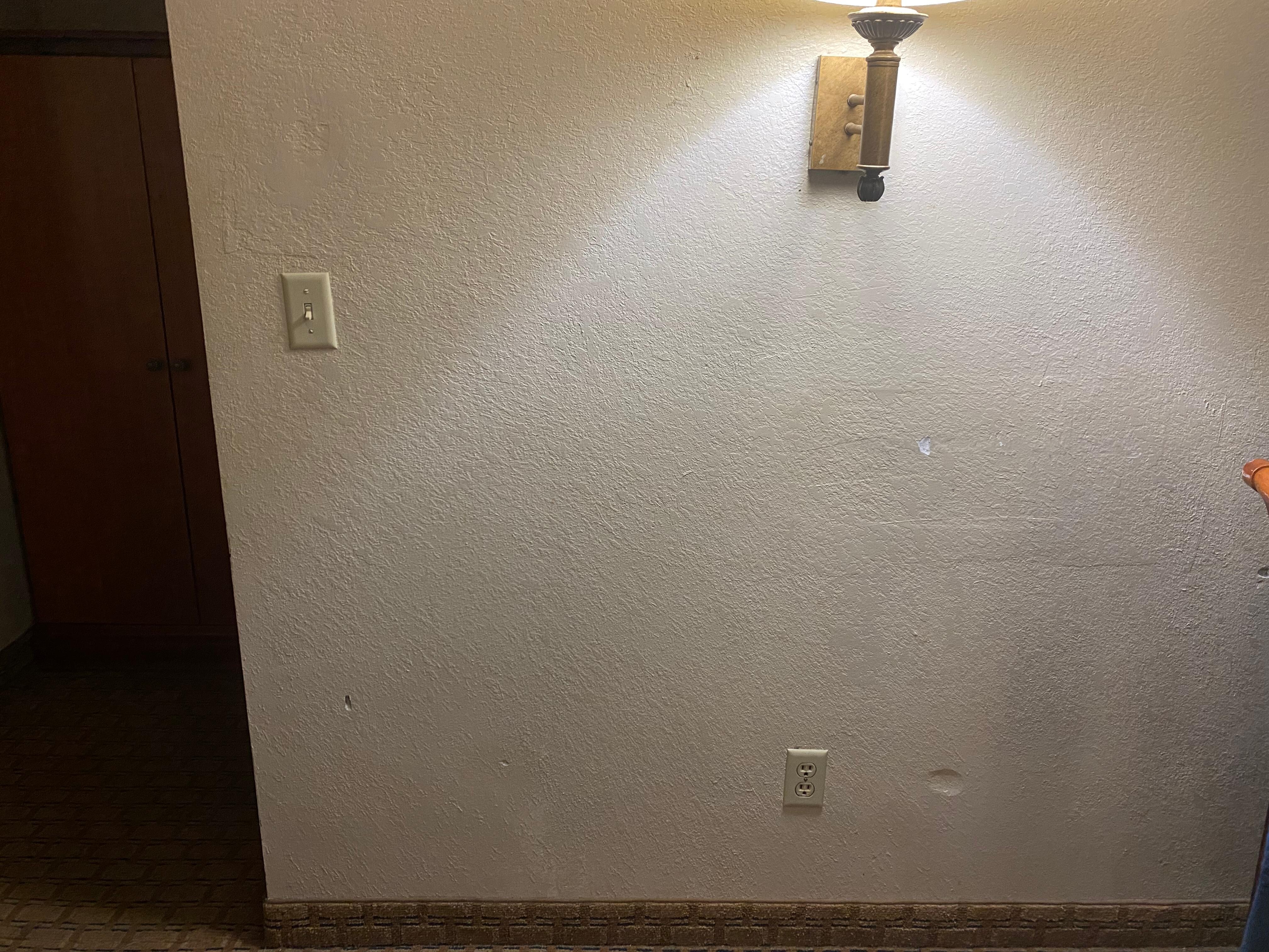 Holes and dents in the wall