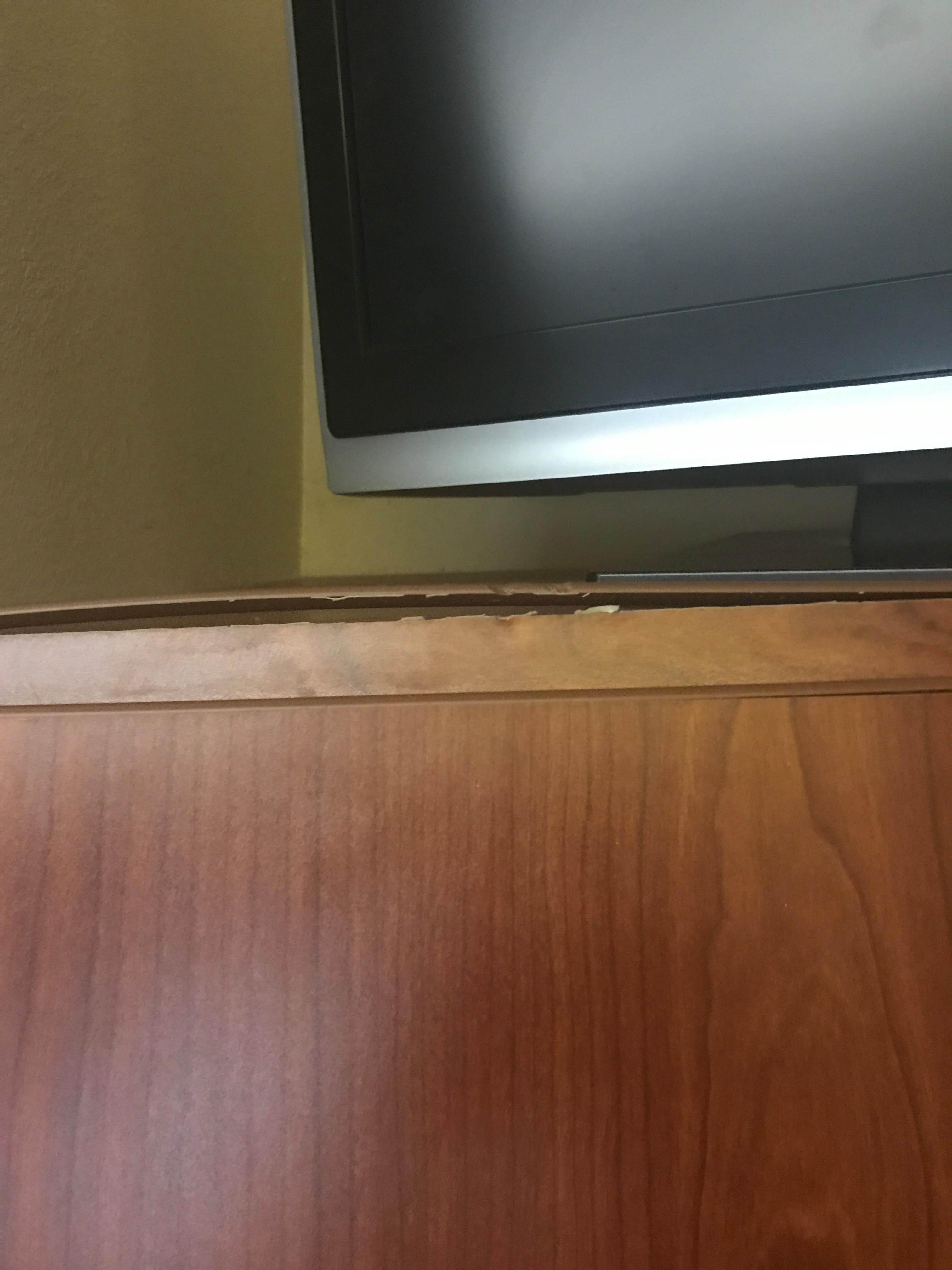 Water damage in front of the dead televison