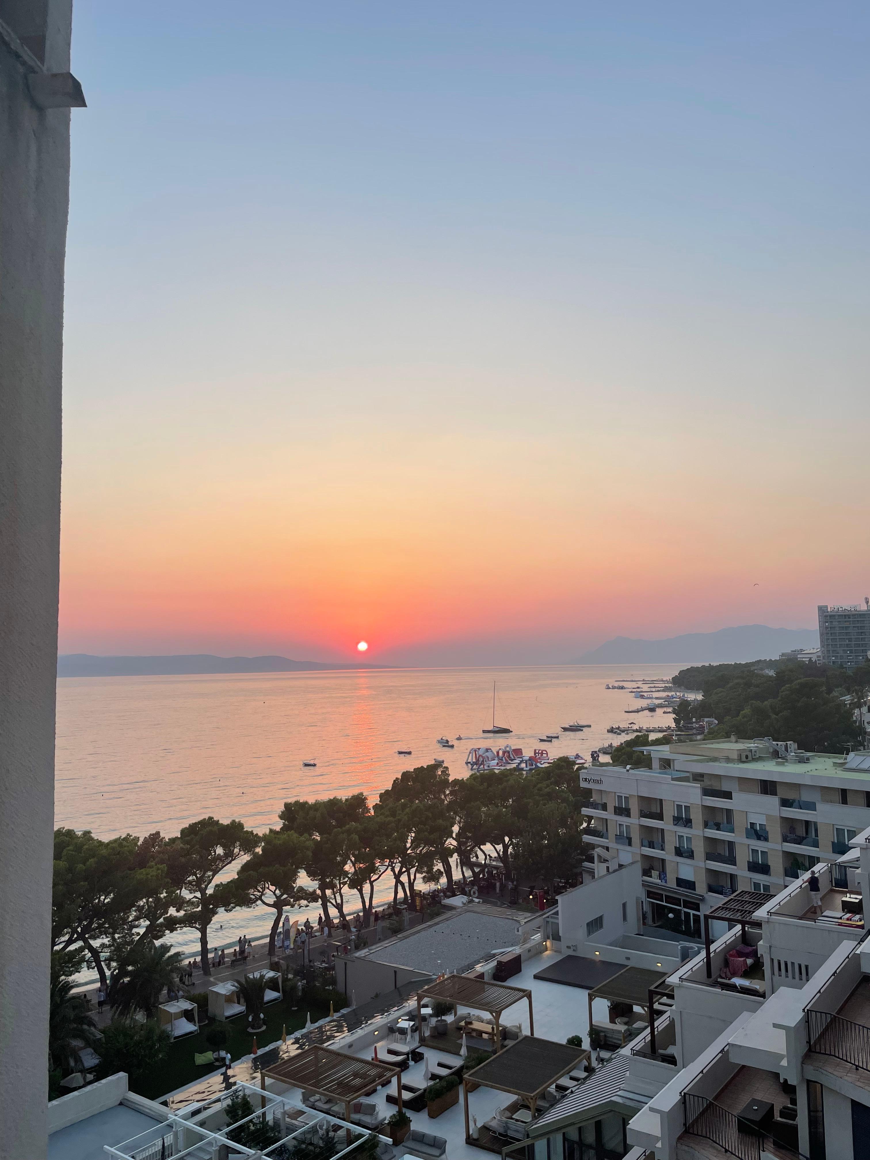 Side sea room view at sunset