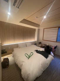 King size bed & mood lighting (our clothing thrown about)