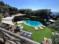Pool from elevated seating area.