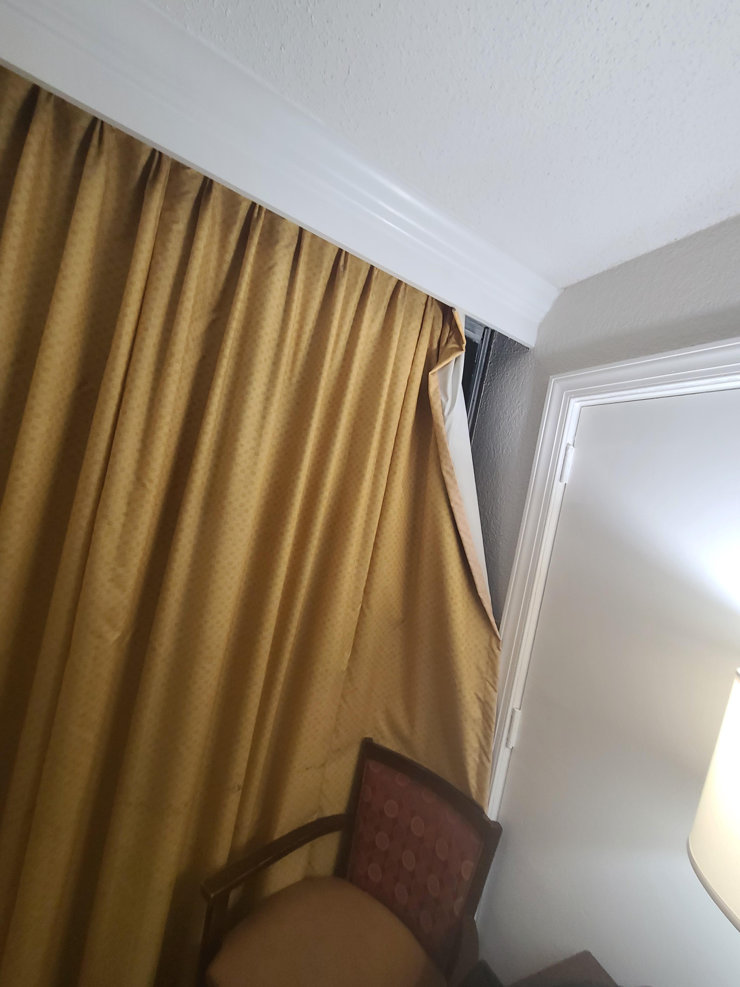 Curtains falling and rusty