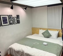 Large King bed in small room.