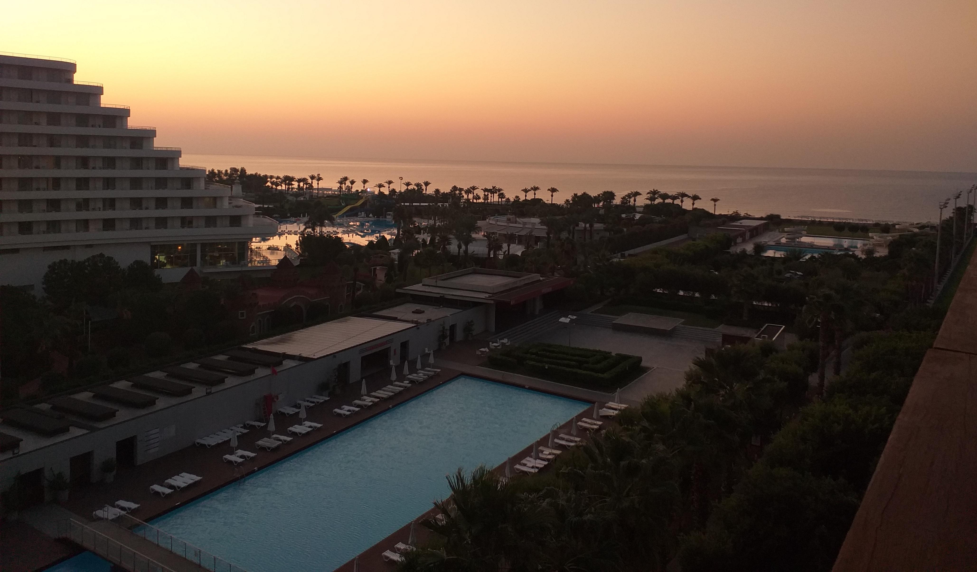 View of the sunrise over the Mediterranean from my guest room balcony.