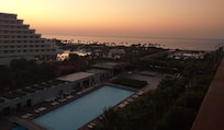 View of the sunrise over the Mediterranean from my guest room balcony.