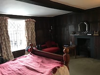 Wood panelled room with full modern comfort