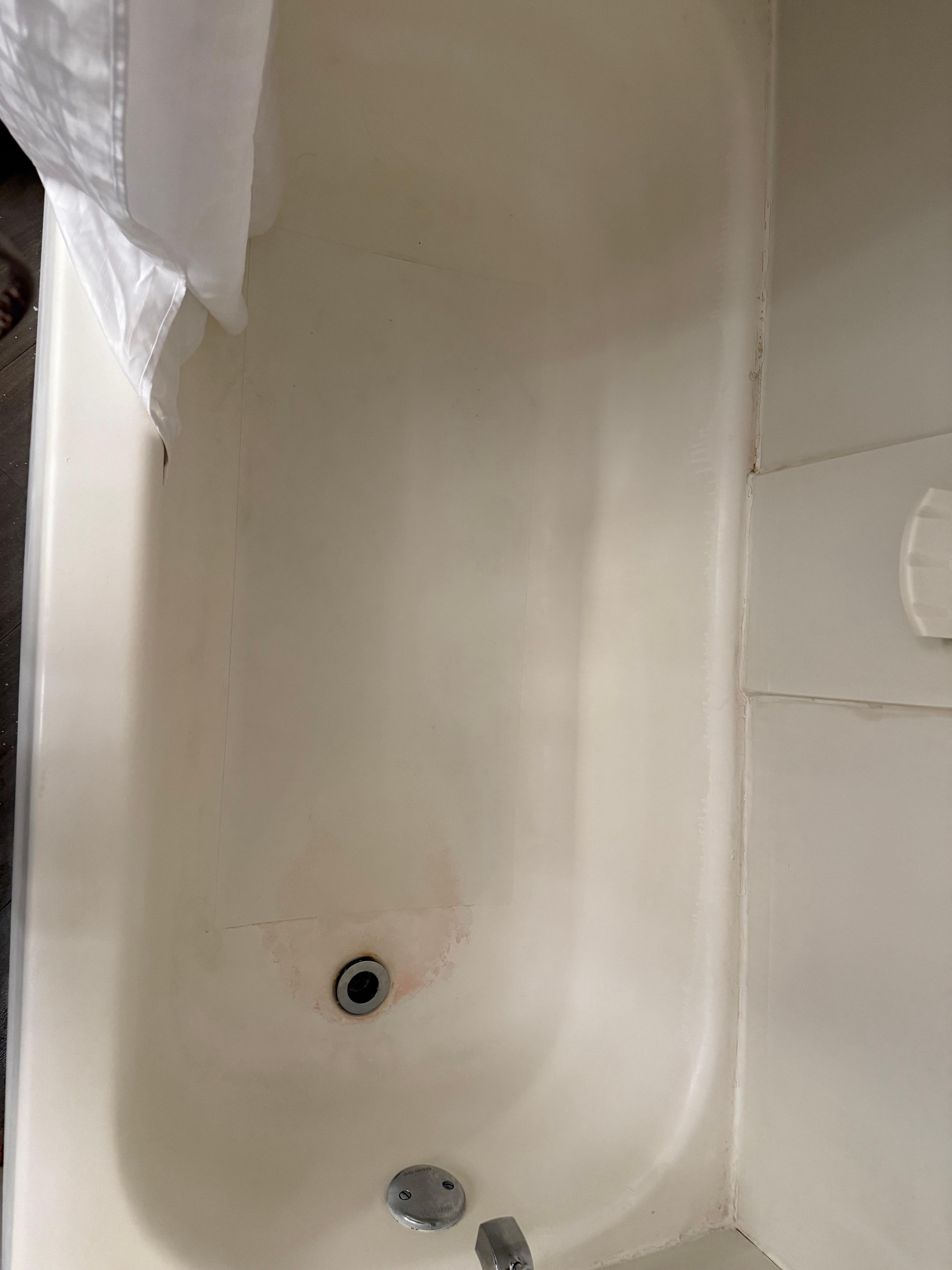 Stained bath tub interior