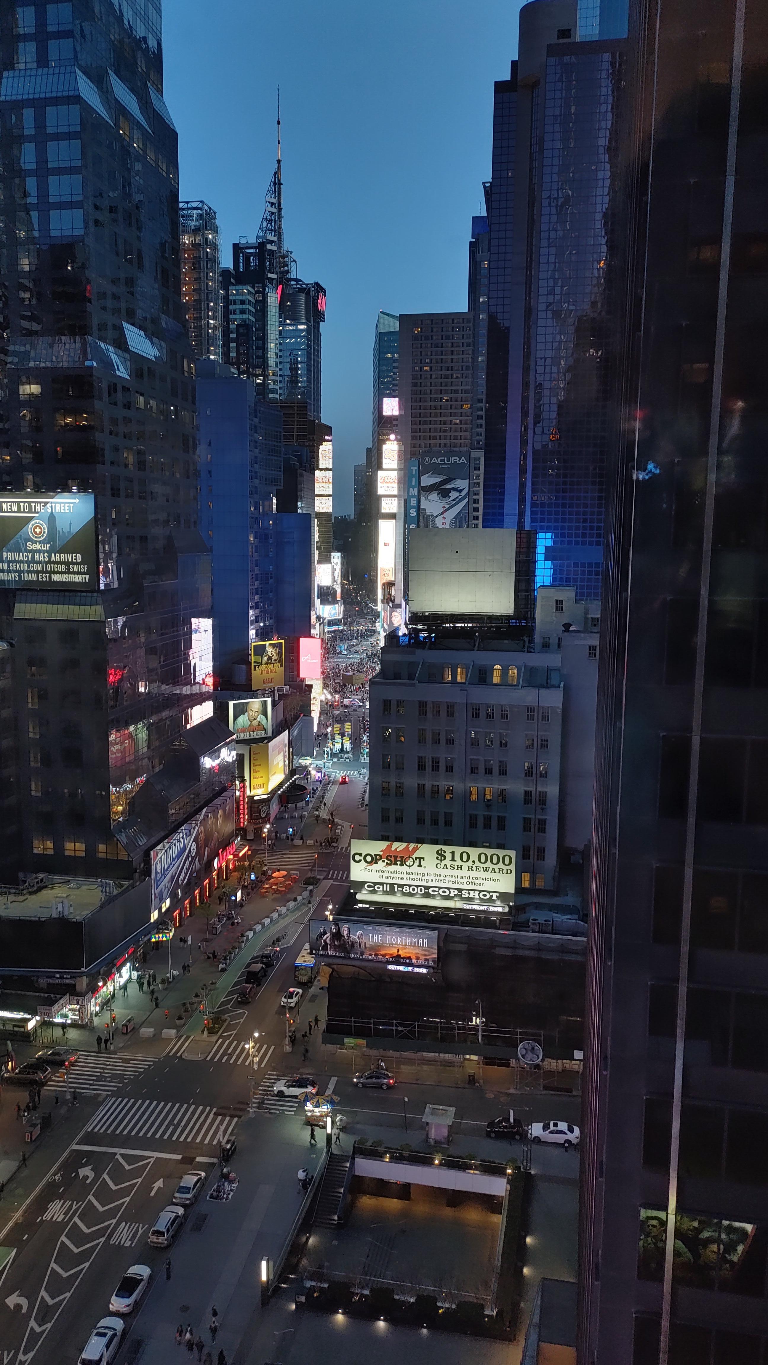 Evening view from hotel room to Times Square.