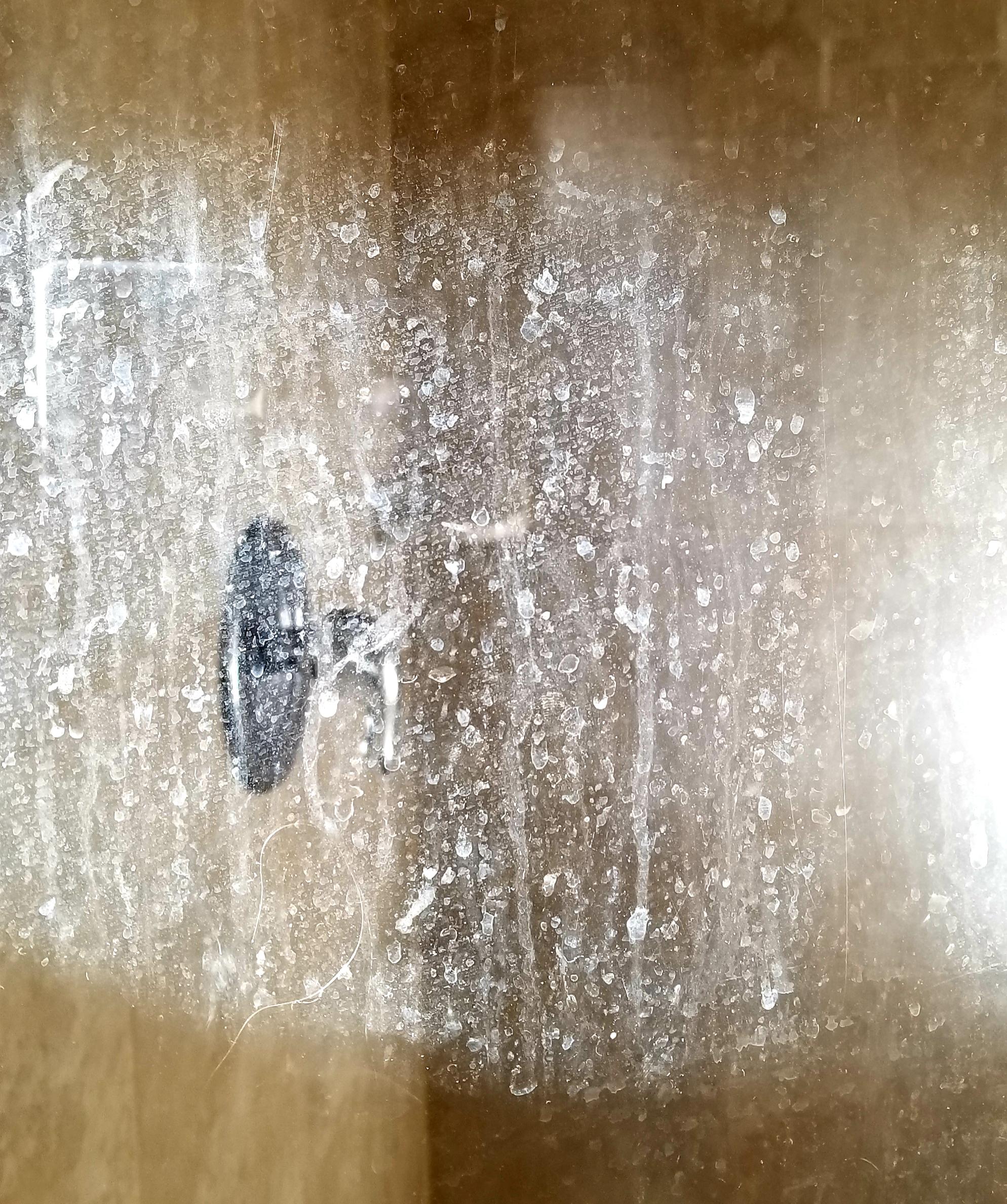 Soap scum on shower door