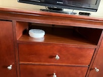 Smoke detector under television and battery is dead.