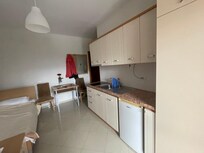Kitchen and bed