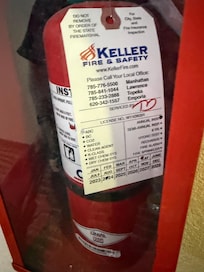 Fire extinguisher out of date by nearly 1 year.