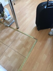 Floor area in kitchen area - lethal floor bar that you could hurt your foot on.