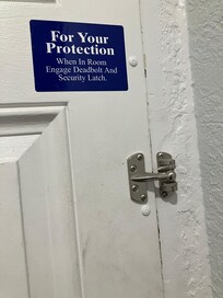 Missing latch to hold the door shut.