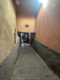 a side road walking toward the riad