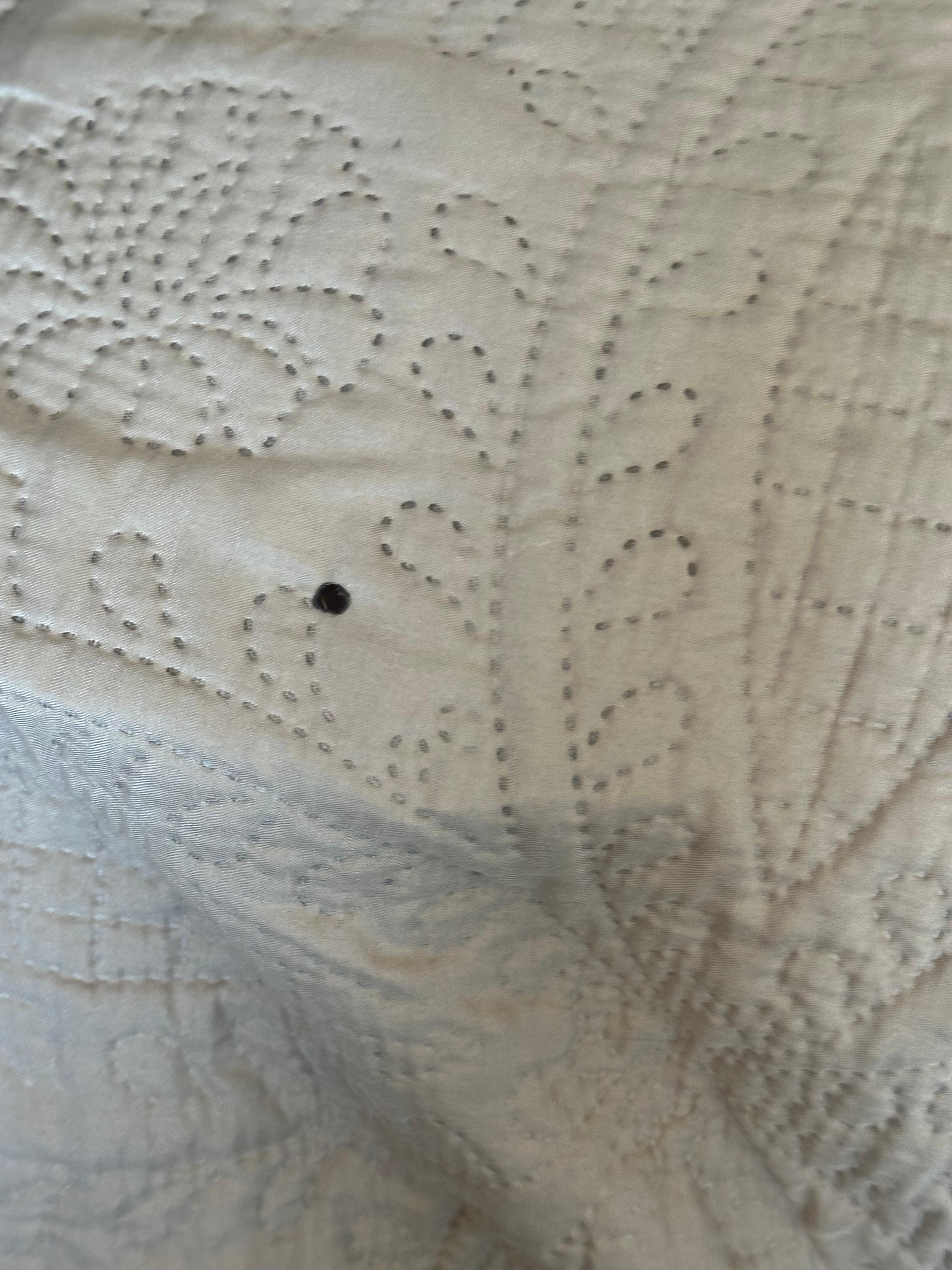 Burn hole in mattress cover