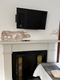 Above Fire Place with the TV that didn't work