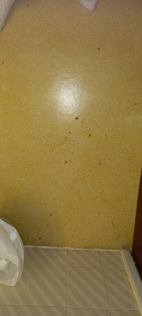 Floor with fag burns
