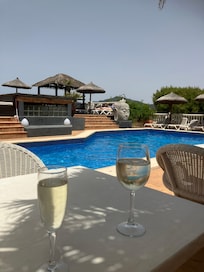 Having a drink by the pool at Bon Repos