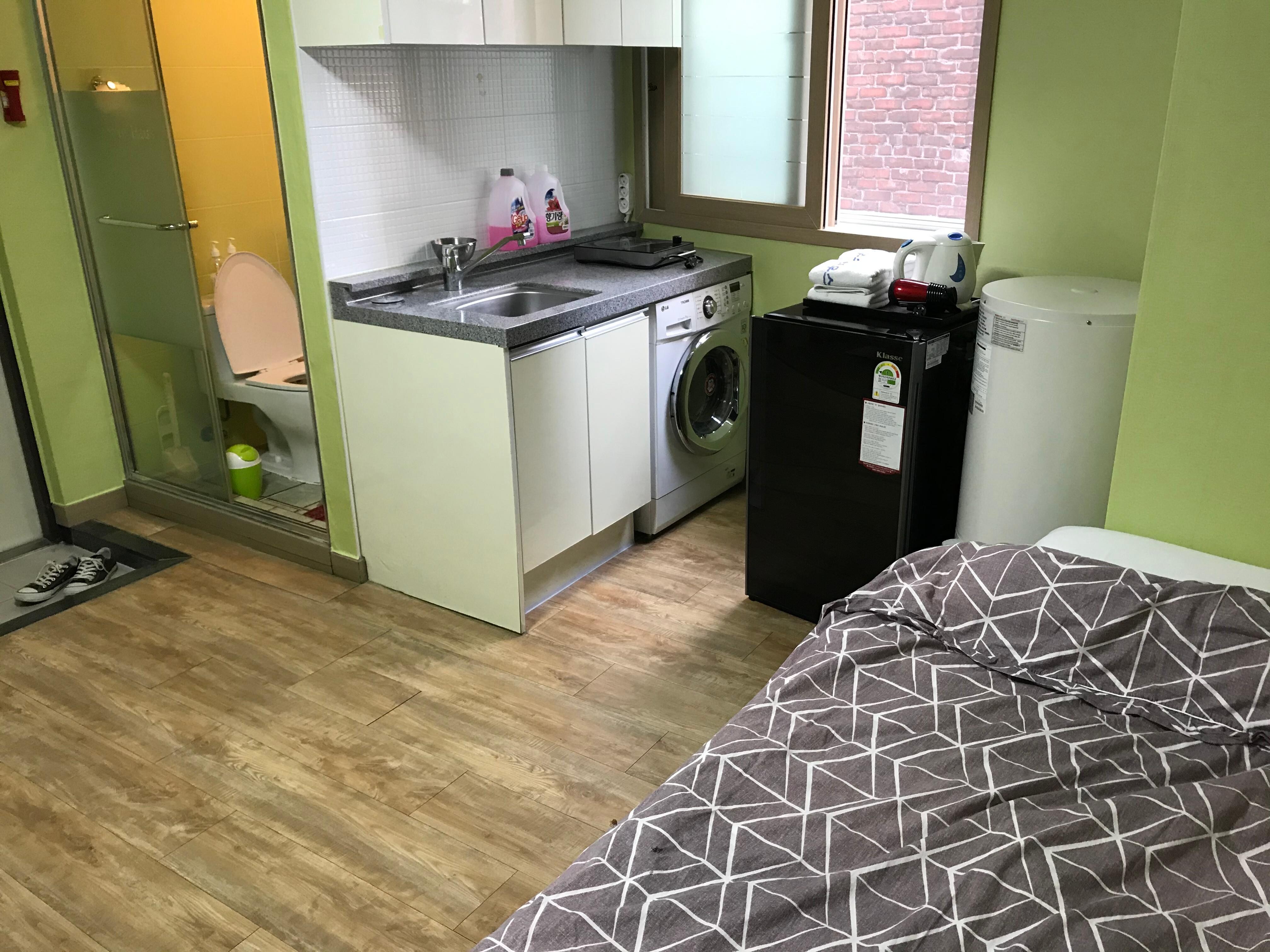 キッチンと洗濯機付きの部屋