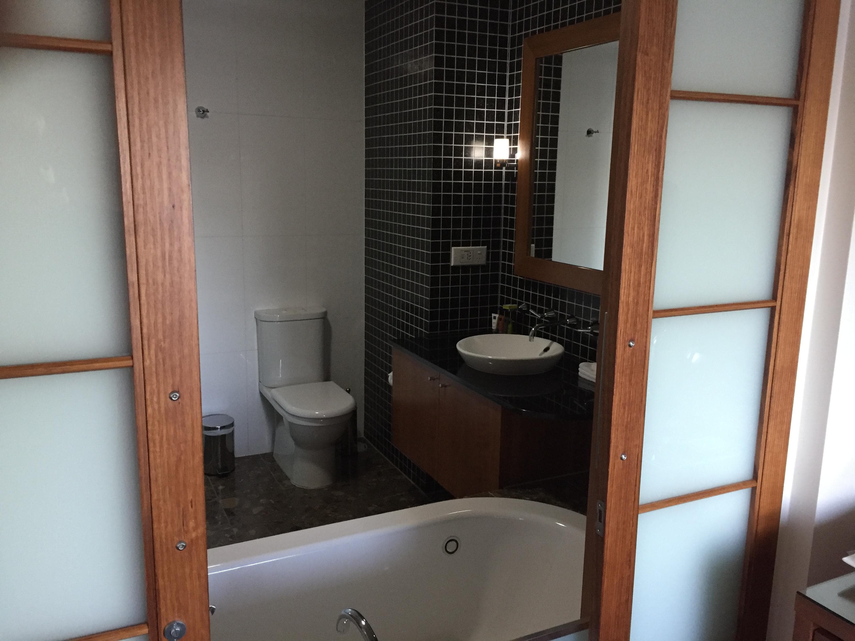 Bathroom opens into the bedroom, a little out there, but cool