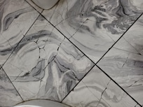 Cracked tiles in bathroom